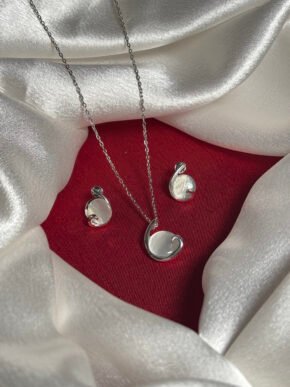 Elegant Silver Swirl Pendant Necklace Set with White Stone