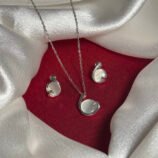 Elegant Silver Swirl Pendant Necklace Set with White Stone